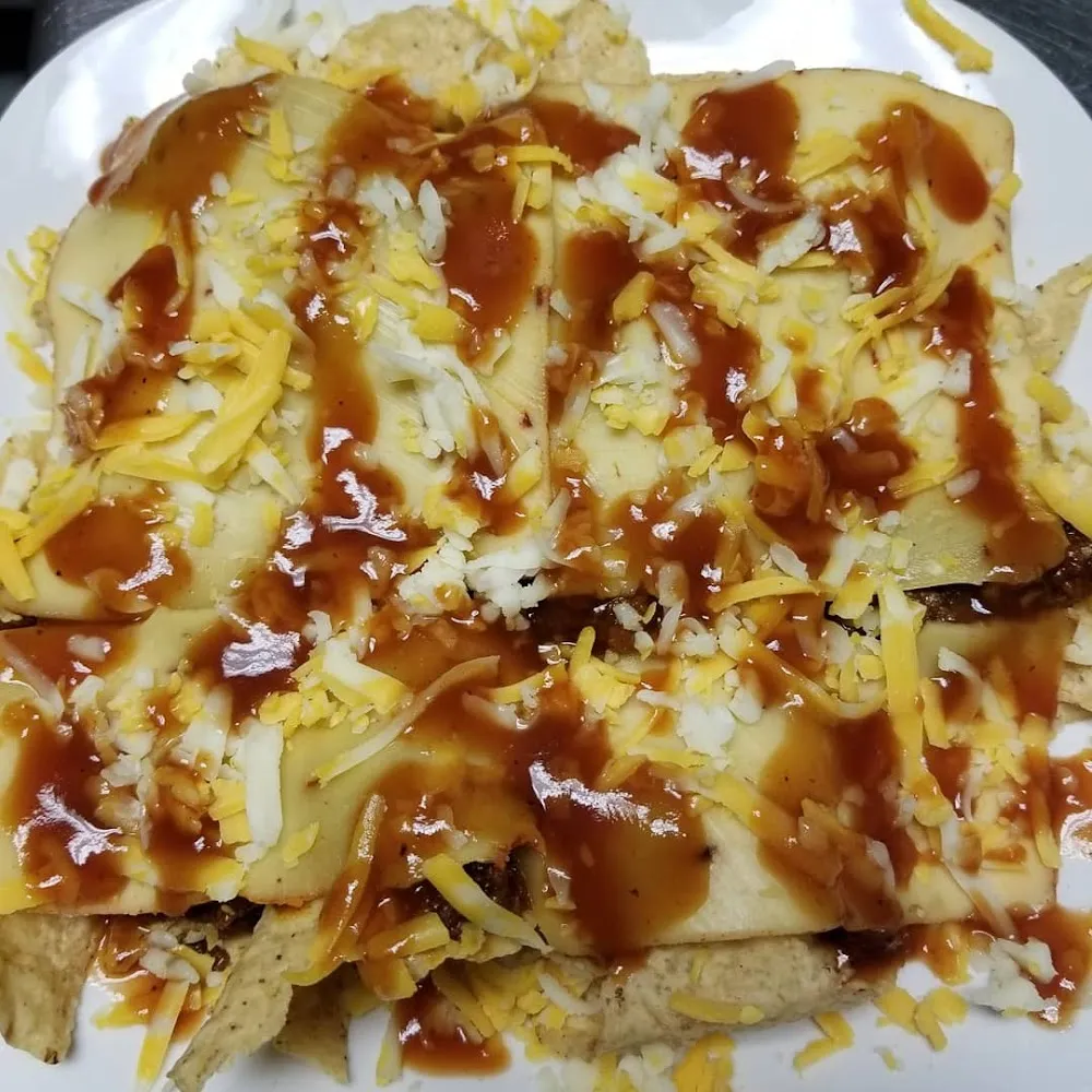 A Daily Special BBQ Pork Nachos Topped with Coleslaw